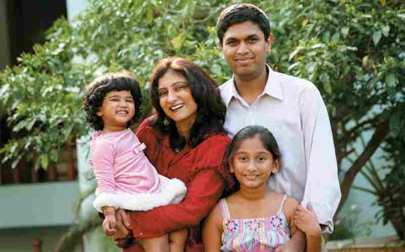Anuradha Acharya with her husband and daughters