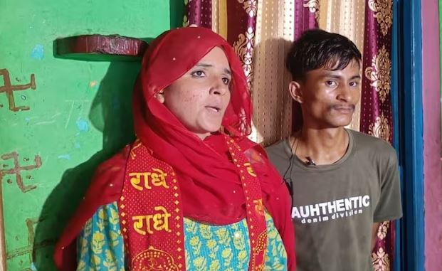 Seema Haider with her lover Sachin Meena wearing a Hindu robe with Radhe Radhe written on it