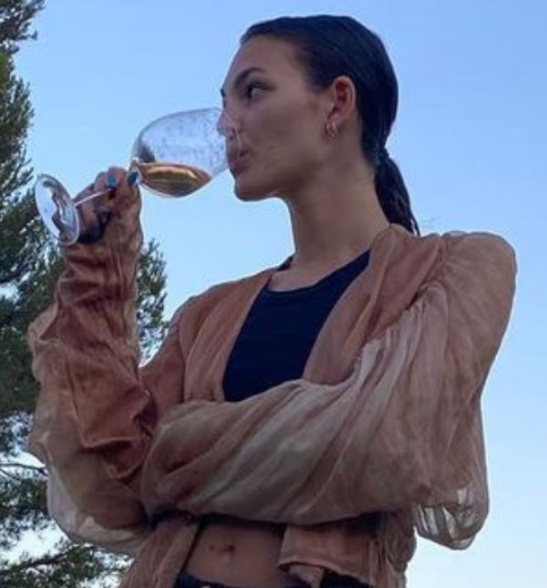 Vittoria Ceretti consuming alcohol