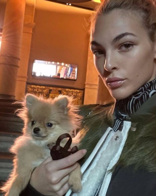 Vittoria Ceretti with her pet dog