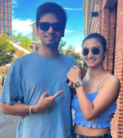 Elisha Mayor with her brother