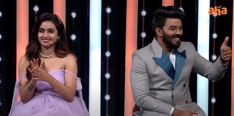 Deepika Pilli (left) as a host in the TV show 'Comedy Stock Exchange'