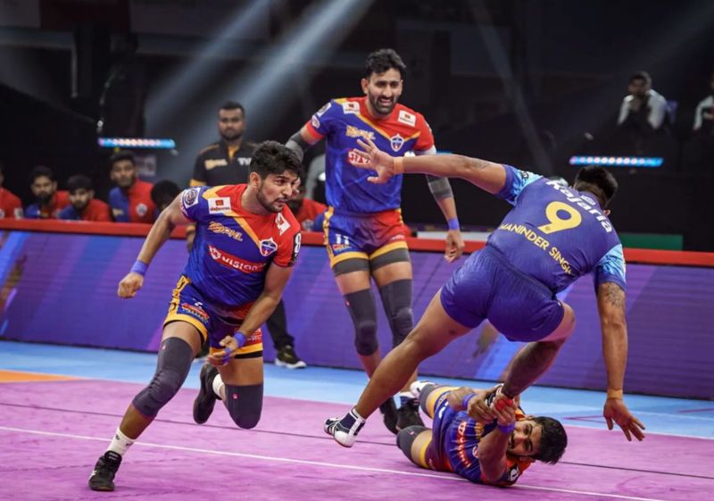 Nitesh Kumar (extreme left) during a match in season 10 of the Pro Kabaddi League (2023)
