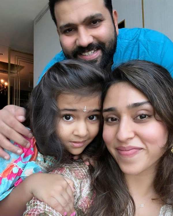 Rohit Sharma with his wife and daughter